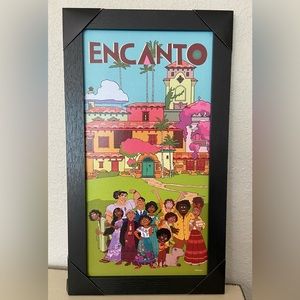 Madrigal family from Encanto in front of Casita wall sign